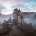 closeup photo of castle with mist