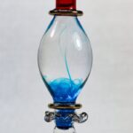 blue and red glass bottle
